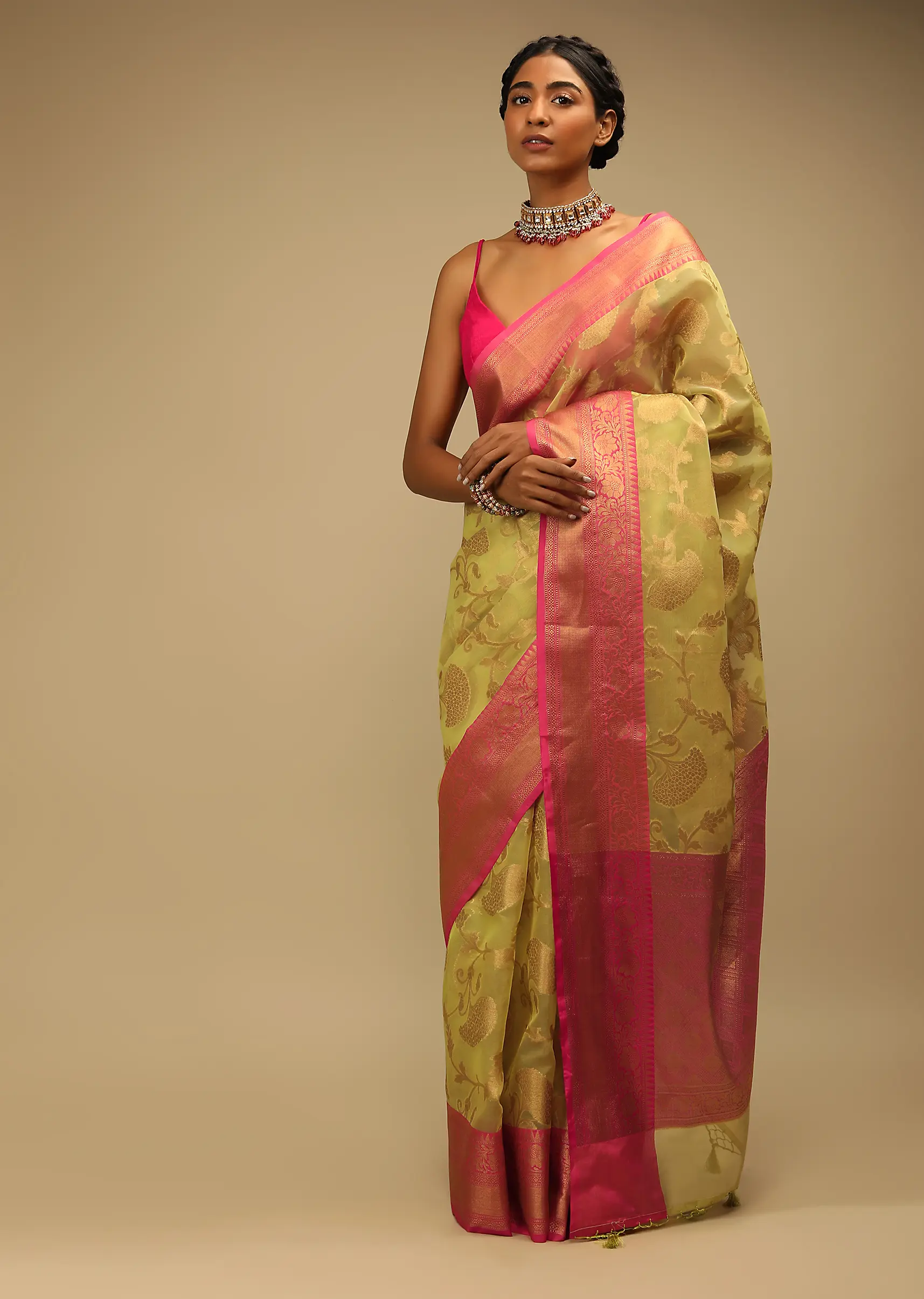 Celery Green Saree In Organza Silk With Golden Brocade Woven Floral Jaal And Magenta Border Design