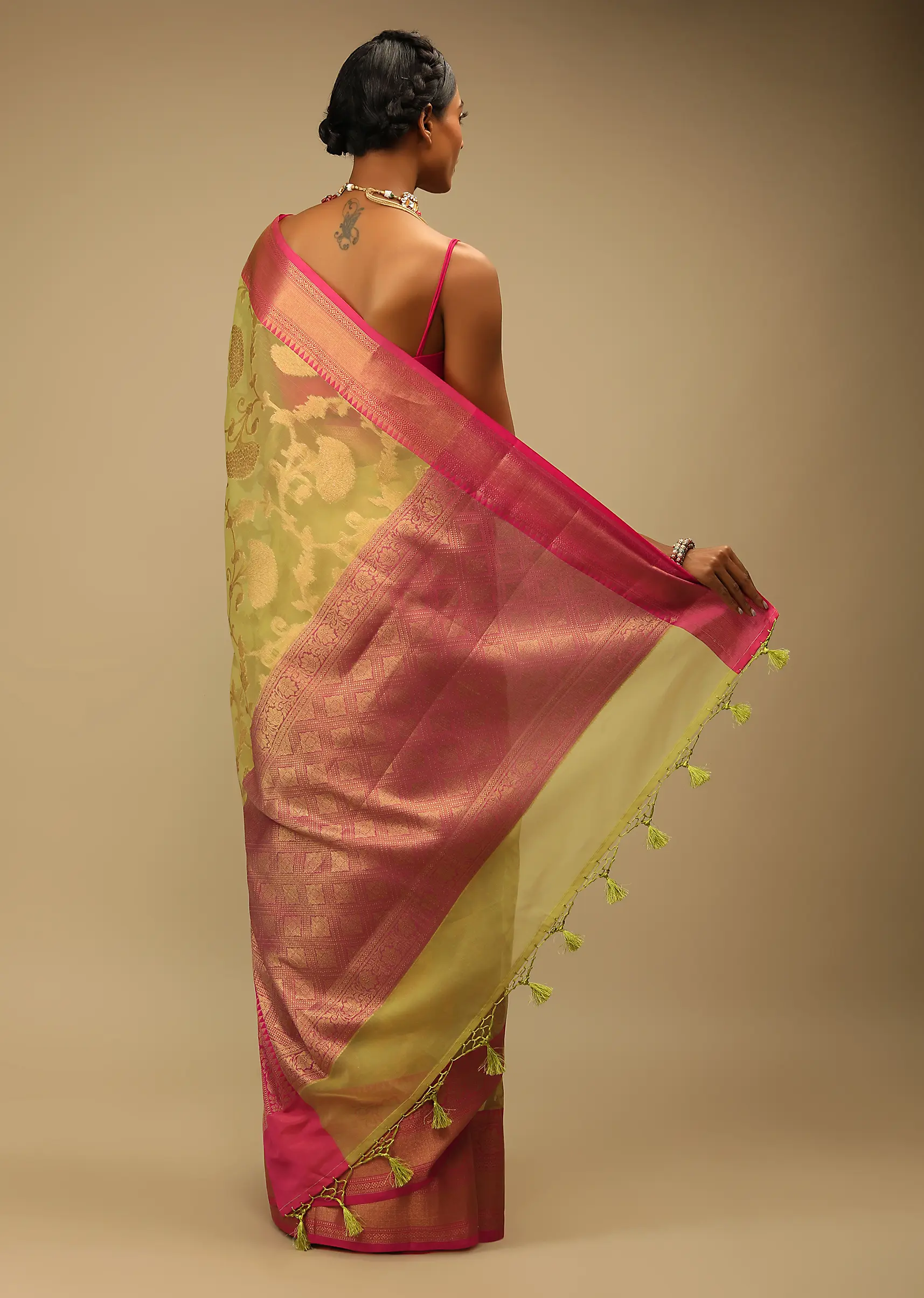 Celery Green Saree In Organza Silk With Golden Brocade Woven Floral Jaal And Magenta Border Design