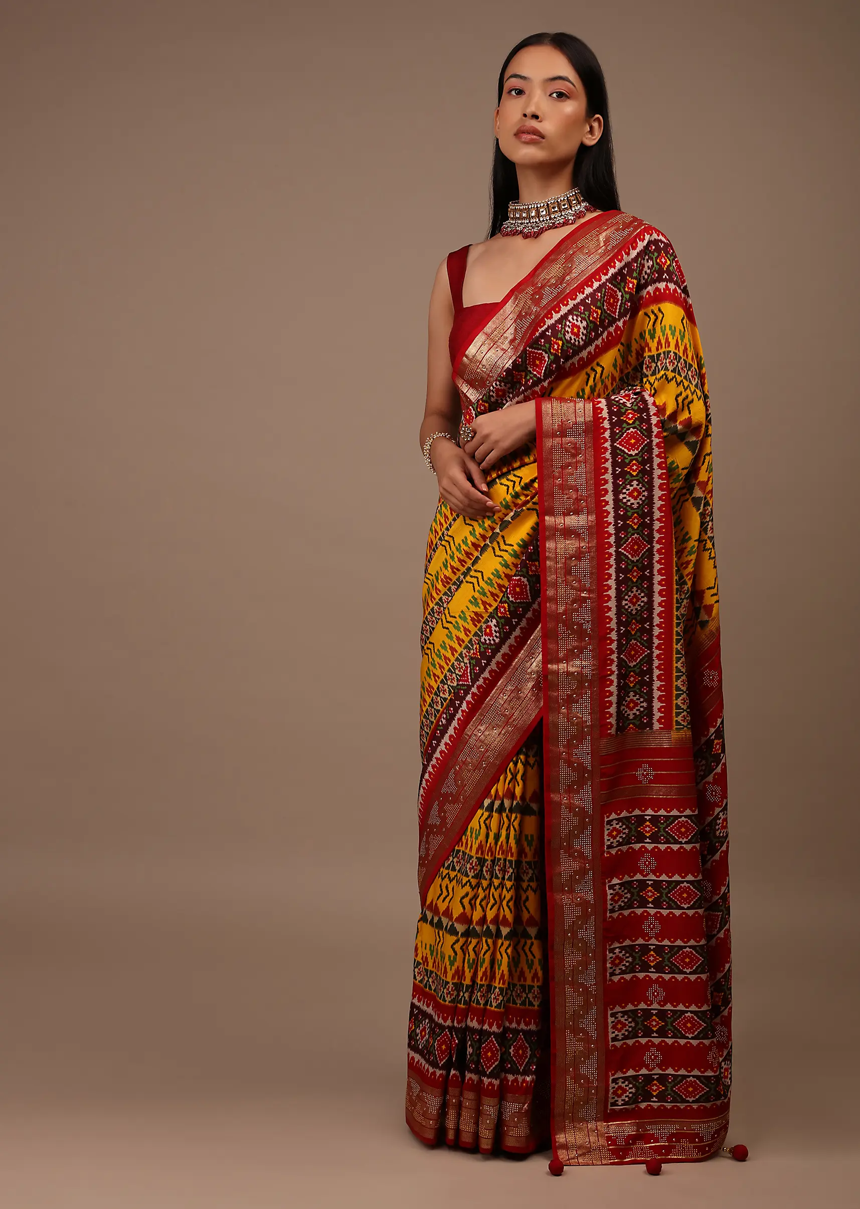 Chrome Yellow Saree In Silk With Multi Colored Patola And Foil Print And Contrasting Maroon Border