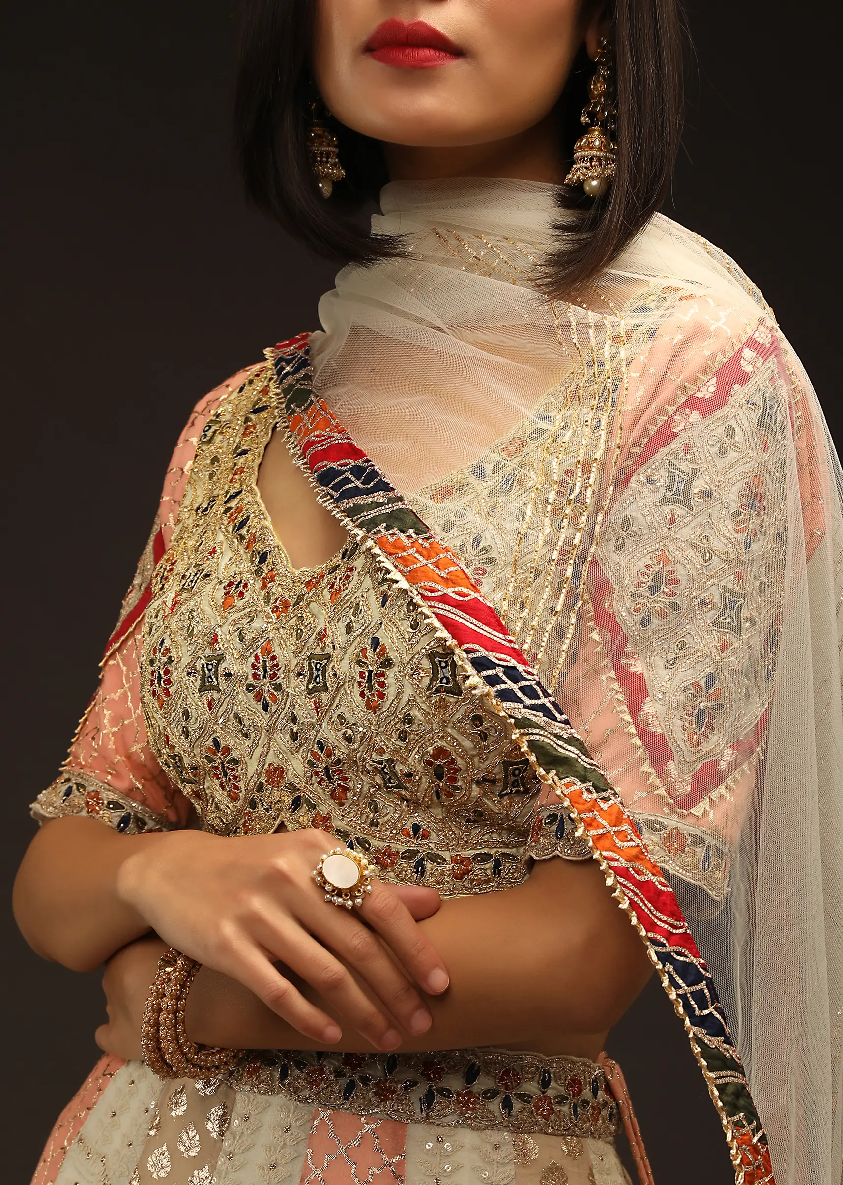 Multi Colored Lehenga Choli With Alternating Kalis Featuring Brocade Detailing And Lucknowi Thread Work