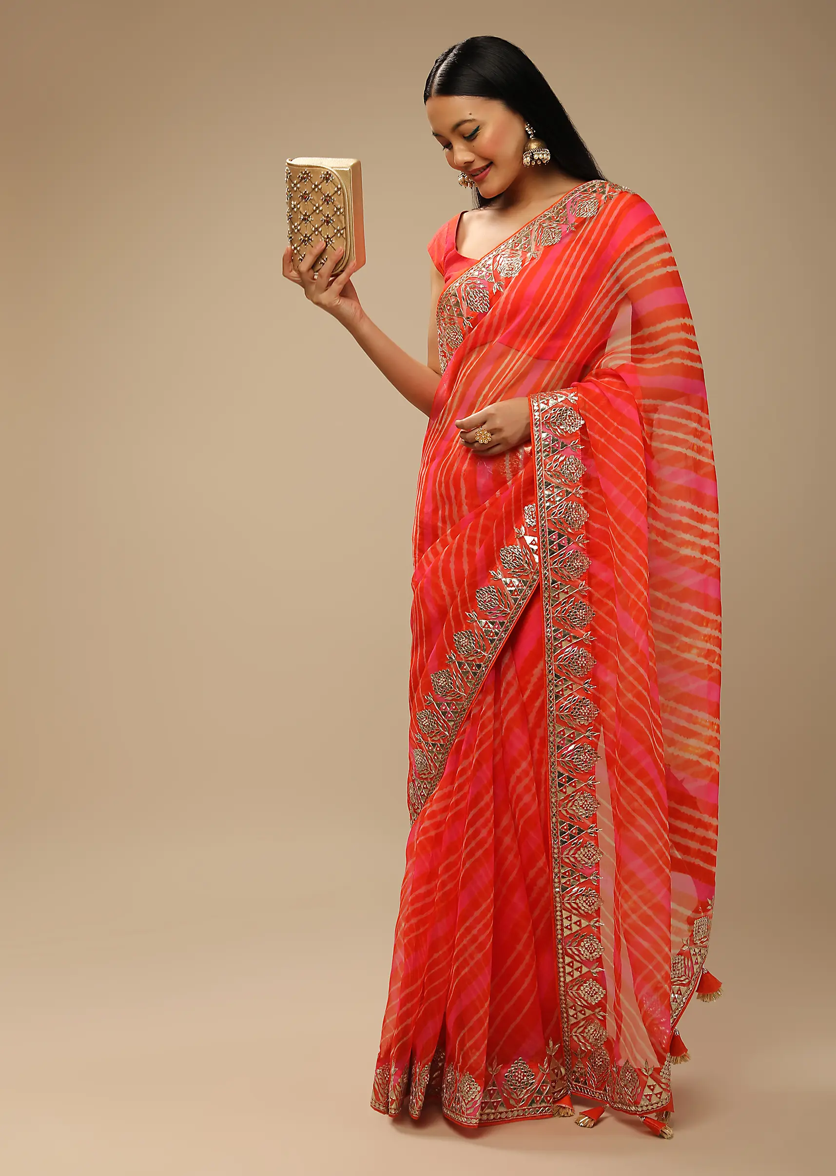 Orange And Fuchsia Dual Toned Saree In Organza With Lehariya Print And Gotta Patti Embroidered Geometric Floral Border